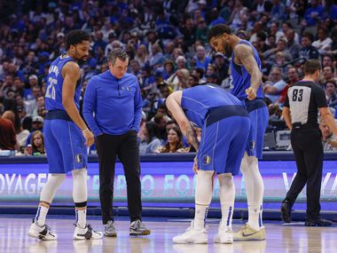 Dallas Mavericks Guard Spencer Dinwiddy (26), Casey Smith, Director of Player Health and…